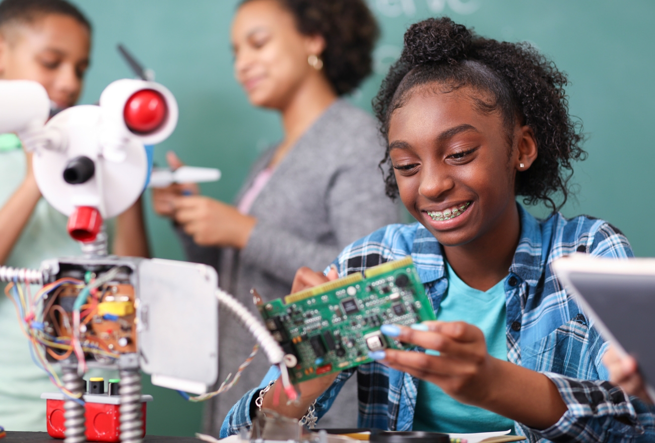 student working on computer board